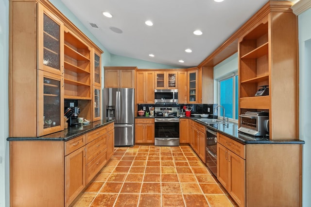 kitchen with stainless steel appliances, a sink, visible vents, backsplash, and open shelves