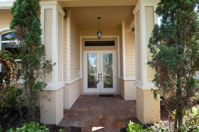 10836 SE Deer Moss Trl, Tequesta, FL 33469 - property entrance featuring french doors