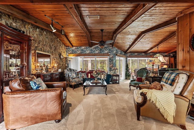 interior space with carpet, wood ceiling, lofted ceiling with beams, and ceiling fan