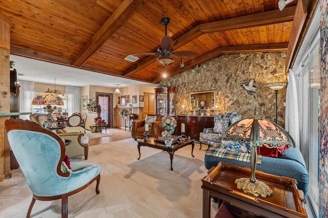 living room featuring lofted ceiling with beams, visible vents, ceiling fan, carpet flooring, and wood ceiling