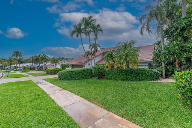 10503 Boca Woods Ln, Boca Raton, FL 33428 - view of front of house featuring a tiled roof and a front yard