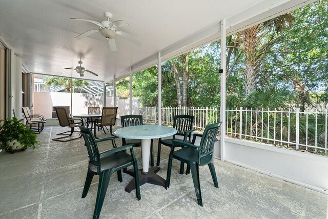 5166 SE Inkwood Way, Hobe Sound, FL 33455 - sunroom with a ceiling fan and outdoor dining area