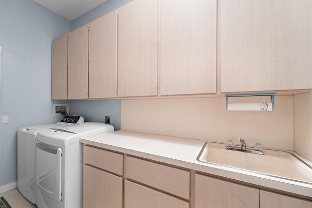 5166 SE Inkwood Way, Hobe Sound, FL 33455 - laundry area with cabinet space, washing machine and dryer, and a sink