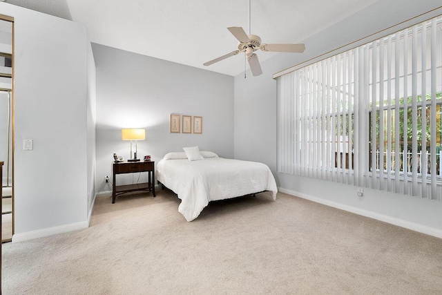 5166 SE Inkwood Way, Hobe Sound, FL 33455 - bedroom featuring carpet, baseboards, and a ceiling fan