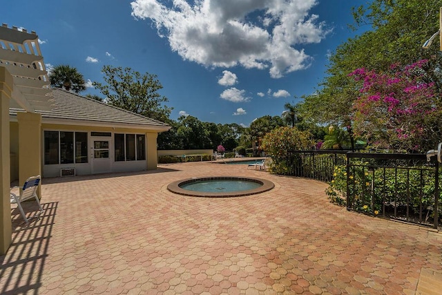 5166 SE Inkwood Way, Hobe Sound, FL 33455 - pool featuring fence, a patio area, and a community hot tub
