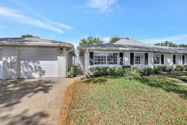 10129 43rd Dr S Unit 311, Boynton Beach, FL 33436 - ranch-style home featuring brick siding, a garage, concrete driveway, and a front yard