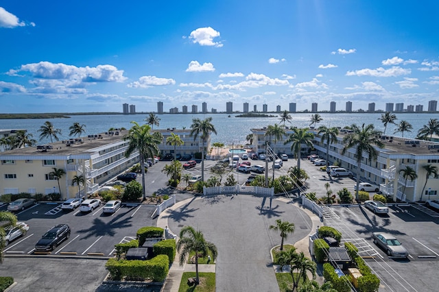drone / aerial view with a water view and a city view