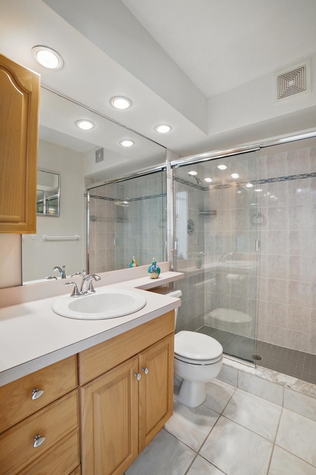 bathroom featuring recessed lighting, tile patterned floors, a shower stall, toilet, and visible vents