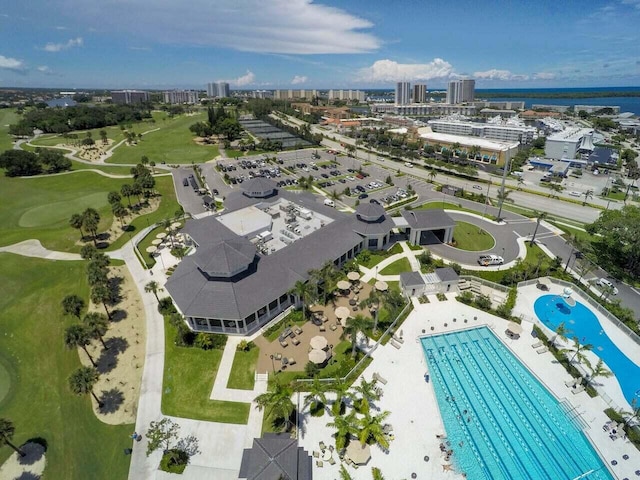 birds eye view of property with a city view