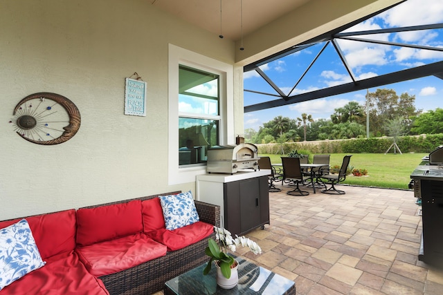 view of patio with outdoor lounge area, outdoor dining space, and a lanai