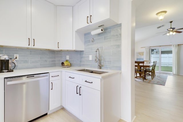 144 Pennock Landing Cir, Jupiter, FL 33458 - kitchen featuring stainless steel dishwasher, a sink, light countertops, tasteful backsplash, and ceiling fan