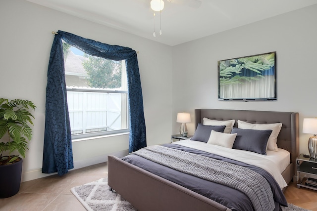 144 Pennock Landing Cir, Jupiter, FL 33458 - bedroom with baseboards, tile patterned floors, and a ceiling fan