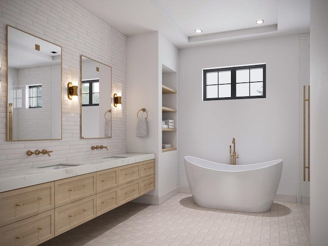 716 NE 2nd St, Delray Beach, FL 33444 - full bathroom with healthy amount of natural light, double vanity, a soaking tub, baseboards, and recessed lighting