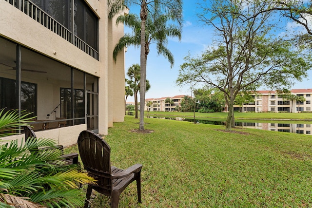 view of yard with a water view