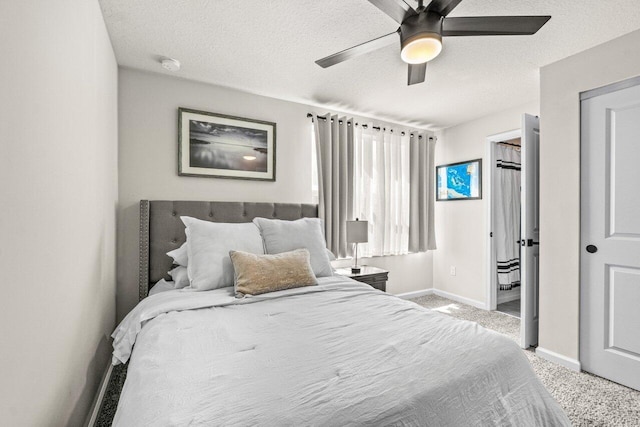 5612 Mentmore Dr, West Palm Beach, FL 33407 - carpeted bedroom with baseboards, a textured ceiling, a ceiling fan, and a closet
