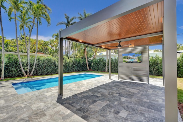 5832 Alton Rd, Miami Beach, FL 33140 - view of swimming pool featuring ceiling fan, a patio area, and a fenced backyard
