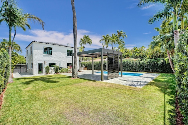 5832 Alton Rd, Miami Beach, FL 33140 - exterior space with a patio, a fenced in pool, stucco siding, a yard, and a fenced backyard