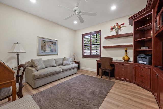 office space with ceiling fan, recessed lighting, light wood-style floors, and baseboards