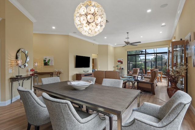 dining room with crown molding, light wood finished floors, recessed lighting, and a ceiling fan