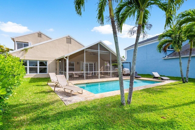12820 Smithdale Pl, Boca Raton, FL 33428 - pool with a patio area, a sunroom, and a lawn
