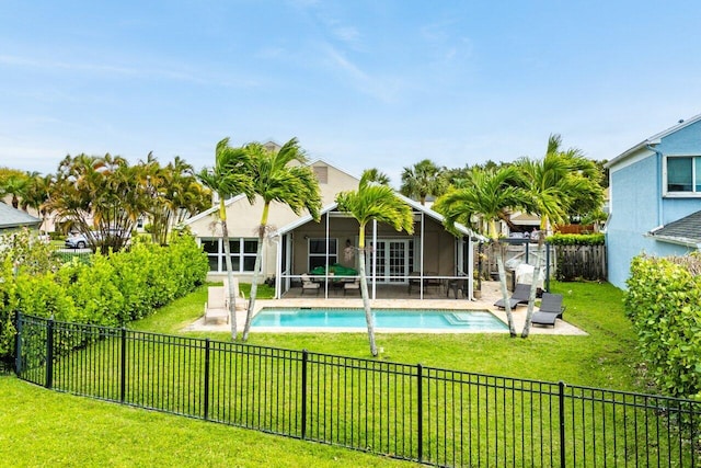 12820 Smithdale Pl, Boca Raton, FL 33428 - view of pool featuring a fenced backyard, a fenced in pool, a sunroom, and a lawn
