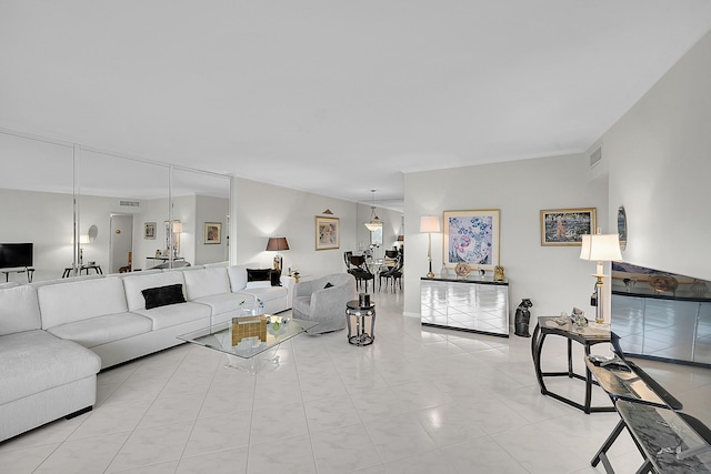 701 E Camino Real Unit 4B, Boca Raton, FL 33432 - living room with light tile patterned floors