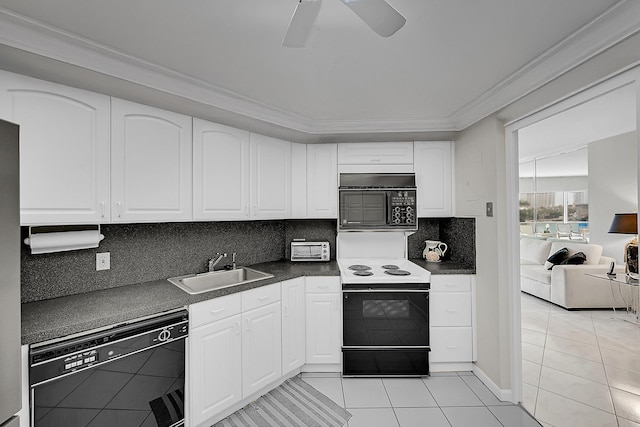 701 E Camino Real Unit 4B, Boca Raton, FL 33432 - kitchen with black appliances, a sink, light tile patterned flooring, dark countertops, and ceiling fan