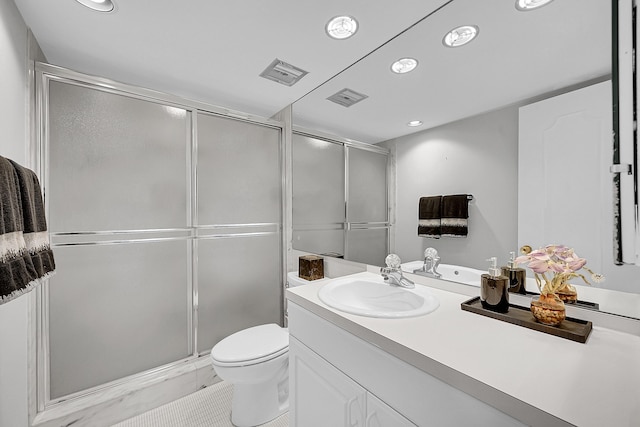 701 E Camino Real Unit 4B, Boca Raton, FL 33432 - full bathroom featuring vanity, toilet, a shower stall, and recessed lighting