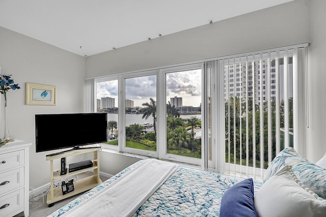 701 E Camino Real Unit 4B, Boca Raton, FL 33432 - bedroom featuring baseboards