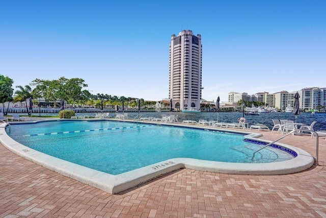 701 E Camino Real Unit 4B, Boca Raton, FL 33432 - community pool featuring a patio area