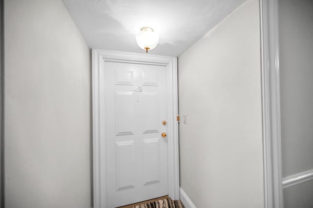 701 E Camino Real Unit 4B, Boca Raton, FL 33432 - doorway with baseboards