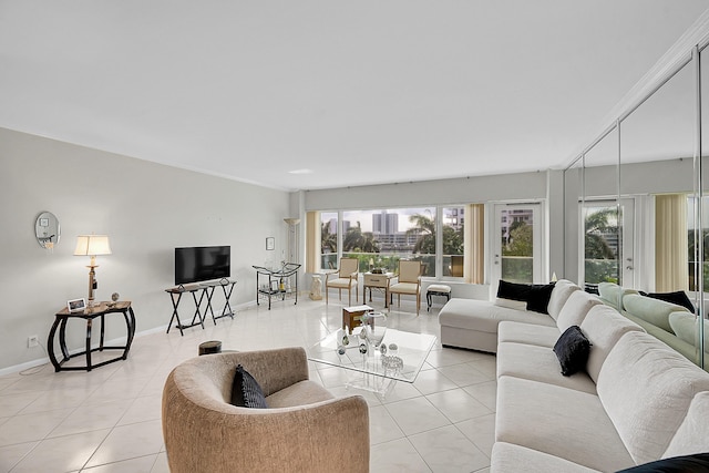 701 E Camino Real Unit 4B, Boca Raton, FL 33432 - living area with light tile patterned floors and baseboards