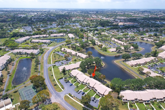 bird's eye view featuring a water view and a residential view