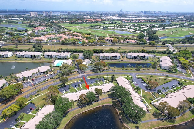 bird's eye view featuring a water view and a residential view