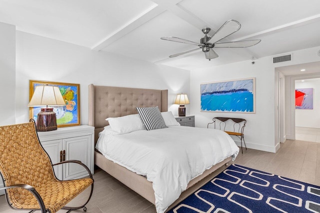2917 S Ocean Blvd Unit 104, Highland Beach, FL 33487 - bedroom featuring wood finished floors, beam ceiling, a ceiling fan, and baseboards