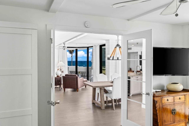 2917 S Ocean Blvd Unit 104, Highland Beach, FL 33487 - living room featuring wood finished floors and a ceiling fan