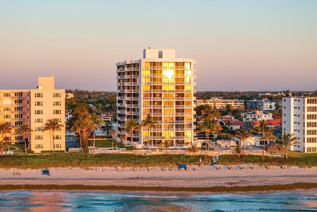 2917 S Ocean Blvd Unit 104, Highland Beach, FL 33487 - view of building exterior with view of water and beach