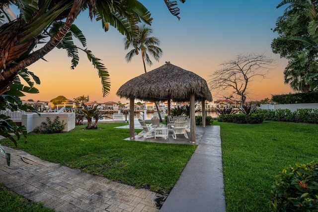 2917 S Ocean Blvd Unit 104, Highland Beach, FL 33487 - view of community featuring a gazebo, a water view, and a patio area
