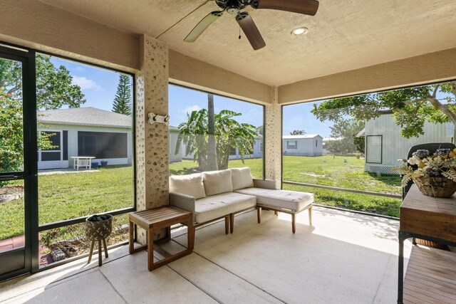 14423 Dalia Ave, Fort Pierce, FL 34951 - sunroom / solarium featuring outdoor lounge area, a ceiling fan, and a healthy amount of sunlight