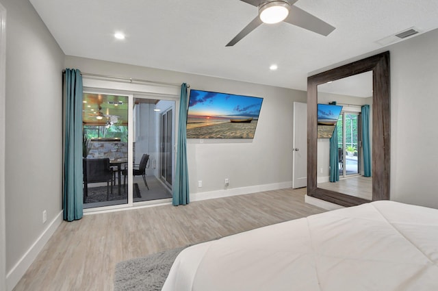 2416 NW 32nd St, Boca Raton, FL 33431 - bedroom featuring access to exterior, wood finished floors, baseboards, a ceiling fan, and recessed lighting