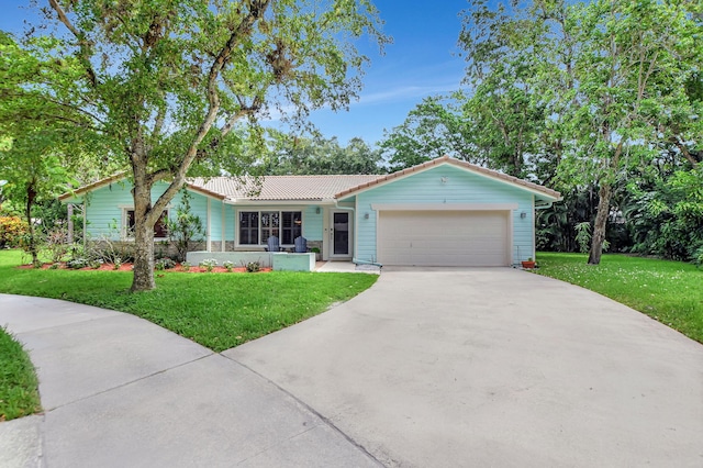 2416 NW 32nd St, Boca Raton, FL 33431 - single story home featuring a garage, concrete driveway, a front lawn, and metal roof