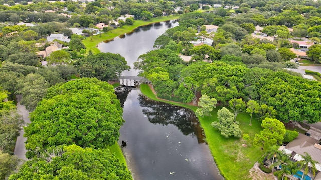 2416 NW 32nd St, Boca Raton, FL 33431 - aerial view of residential area featuring a large body of water and a tree filled landscape