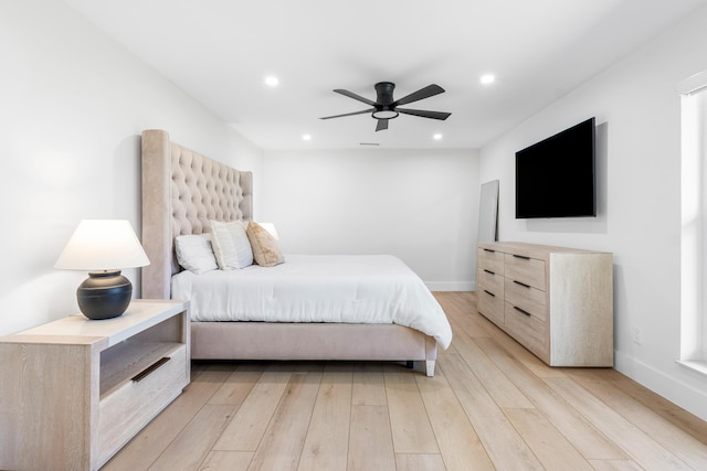 654 Lakewoode Cir W, Delray Beach, FL 33445 - bedroom with light wood-type flooring, recessed lighting, and a ceiling fan