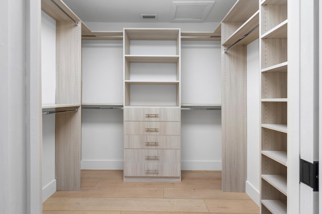 654 Lakewoode Cir W, Delray Beach, FL 33445 - spacious closet with light wood-style flooring