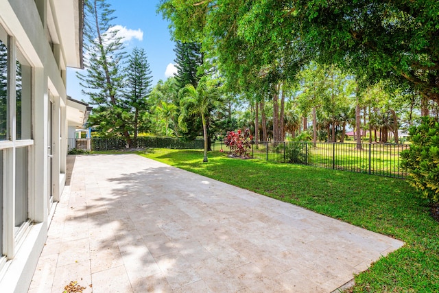 654 Lakewoode Cir W, Delray Beach, FL 33445 - fenced backyard featuring a patio area