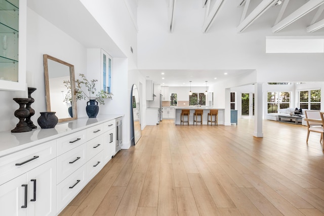 654 Lakewoode Cir W, Delray Beach, FL 33445 - foyer entrance with a high ceiling and light wood-type flooring
