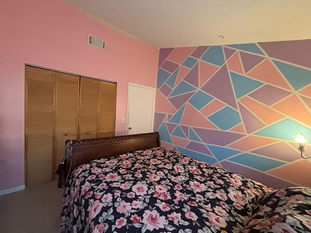 bedroom with visible vents and baseboards