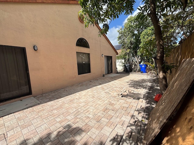 view of patio with fence