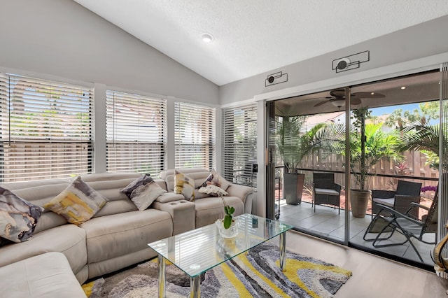 21687 Cromwell Cir, Boca Raton, FL 33486 - living area with ceiling fan, lofted ceiling, a textured ceiling, and a wealth of natural light