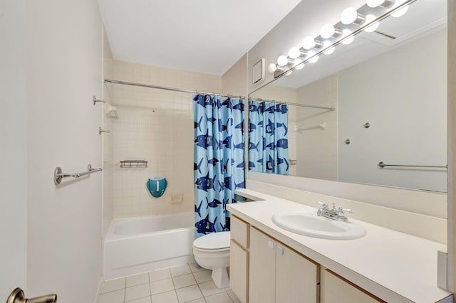 bathroom featuring toilet, tile patterned floors, shower / tub combo, and vanity